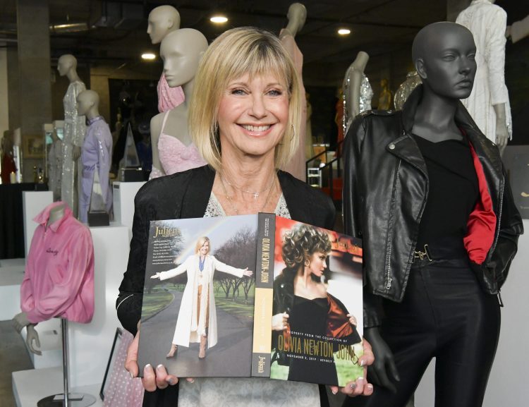 Billionaire returns auctioned Grease jacket to Olivia Newton-John