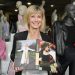 Billionaire returns auctioned Grease jacket to Olivia Newton-John