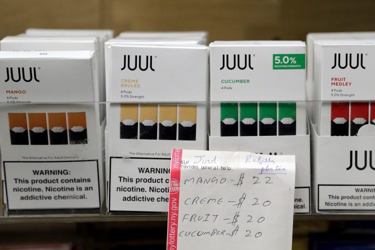Government-funding package includes proposal to raise tobacco-buying age to 21