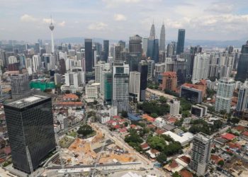 Malaysia wants to break up big firms without hurting stocks, Economy News & Top Stories
