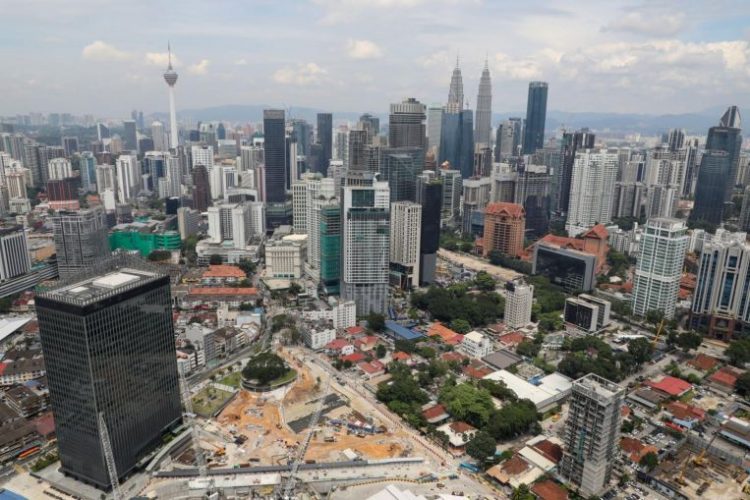 Malaysia wants to break up big firms without hurting stocks, Economy News & Top Stories