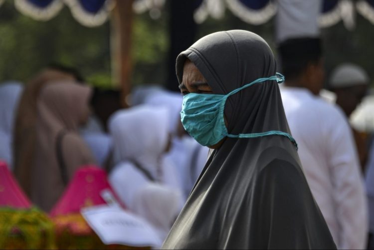 Virus cover-up concern goes viral in Indonesia
