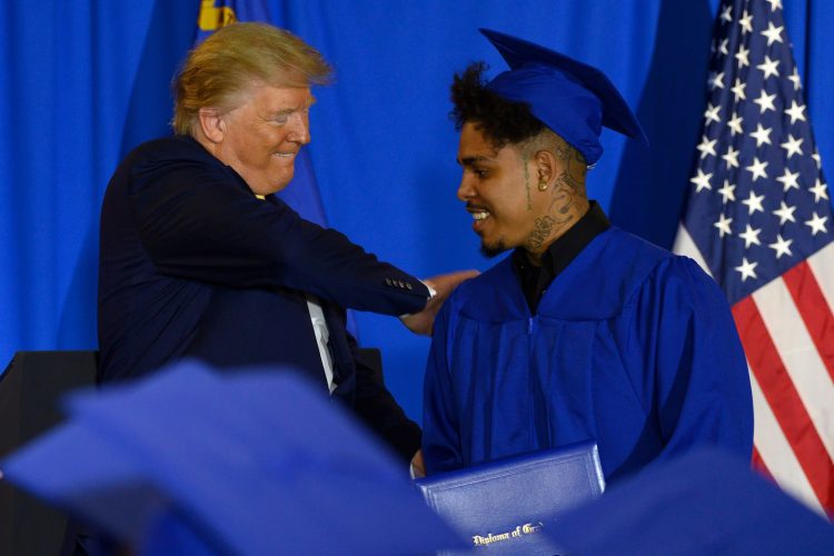 Trump courts minority men with mix of policy and personal appeals