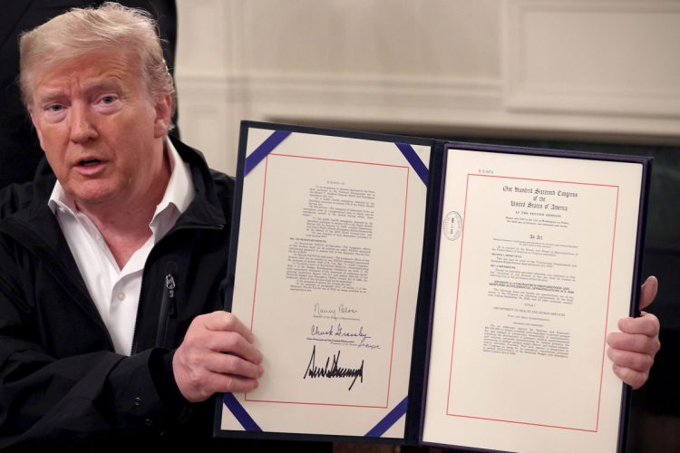 Trump signs $8.3 billion funding package to fight coronavirus