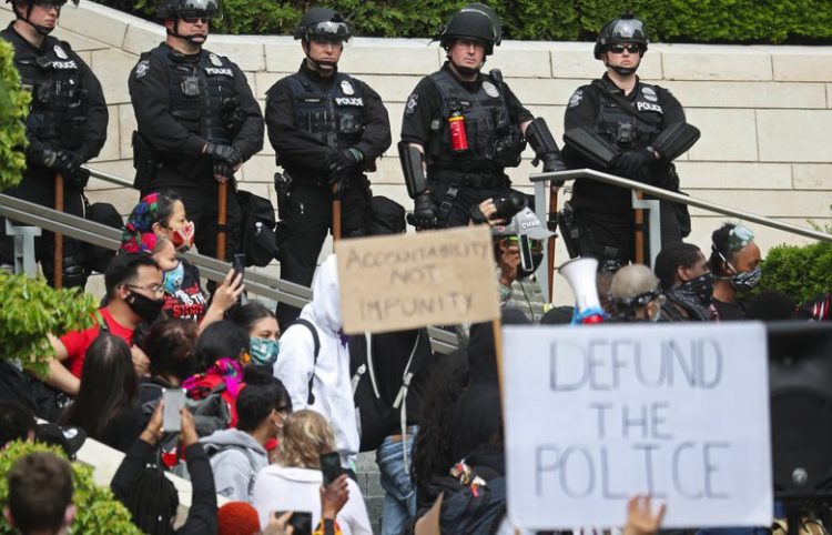 In activists’ demands to defund police, calls to fund housing and human services 