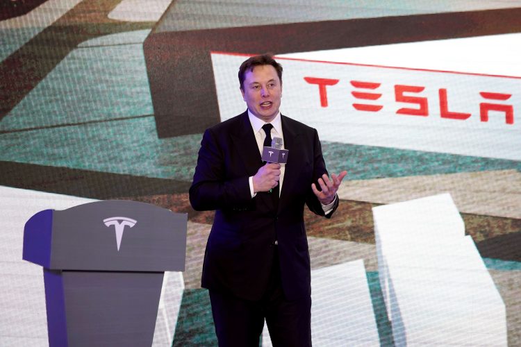 Tesla shares hit record closing price