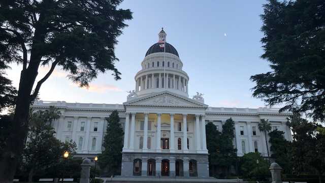 California uses funding as threat over virus measures