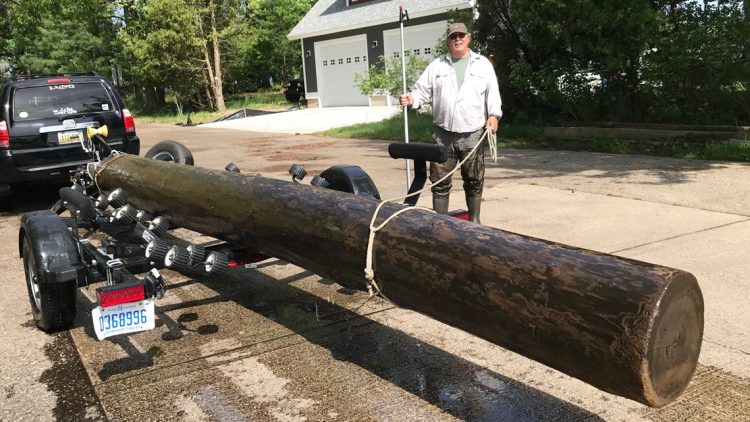 Centuries-old log from Michigan’s lumbering era found floating in Pentwater Lake