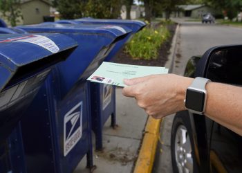 House debates postal changes, funds in rare Saturday session