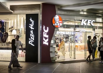 Yum China shares start trading in Hong Kong in secondary listing