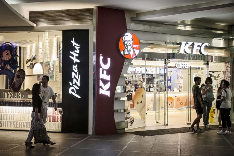 Yum China shares start trading in Hong Kong in secondary listing