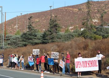 Parents, kids want back on campus