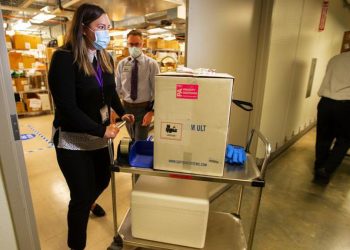 Teachers, grocery workers, prison guards and oldest Americans may be next in line for COVID-19 vaccine