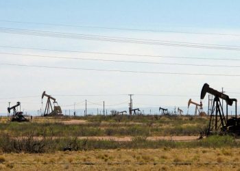 Oil companies stockpile drilling permits, challenging Biden on climate