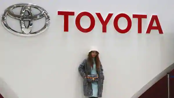 Toyota says Q3 net profit soared, hikes full-year outlook