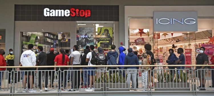 Local GameStop stock traders inspired by anti-hedge fund message despite losses | Business